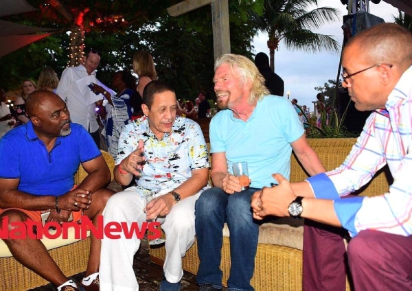 With famed entrepreneur Richard Branson, Minister of Tourism Kerrie Symmonds and CEO of Barbados Hotel